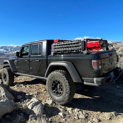 Xtrusion Overland XTR1 Bed rack for Jeep Gladiator with Molle Panels, RotoPax, Hi-Lift, and Traction boards.